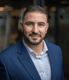 Portrait of Sofian Hamiti, author and technology leader at Amazon Web Services specializing in AI solutions, Generative AI, and building high-performing teams for global impact
