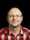 Portrait of Vadim Omeltchenko, author and Senior Solutions Architect at Amazon Web Services specializing in Amazon Bedrock, Generative AI, and Go-to-Market cloud innovation