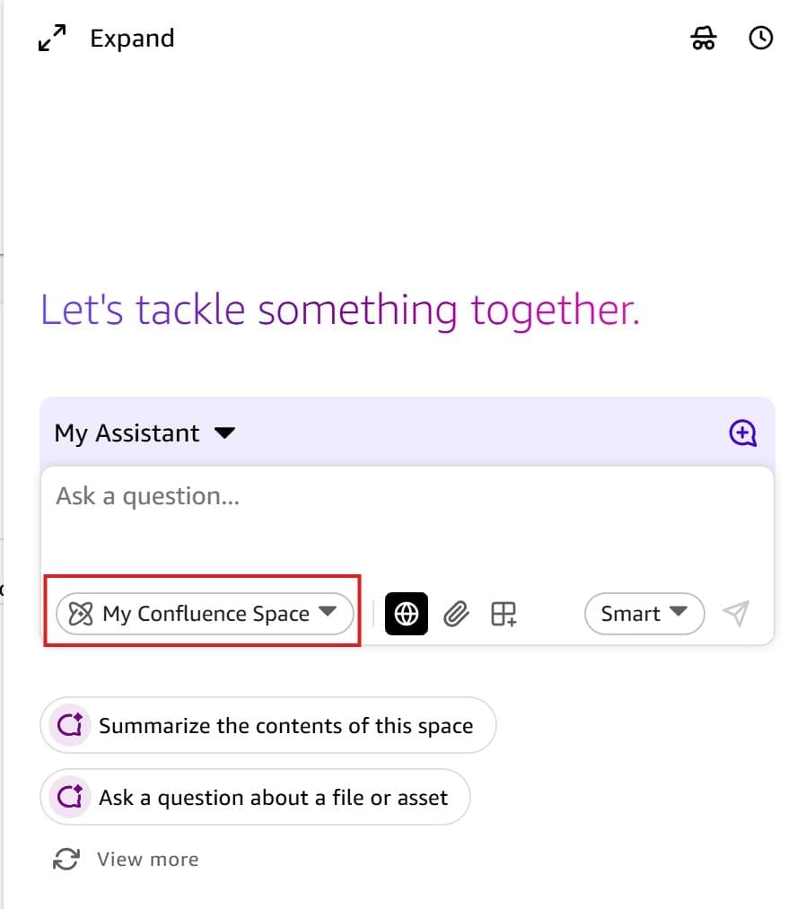 Screenshot of an Amazon Quick AI assistant chat interface inside a Space. The chat window shows a 'Let's tackle something together.' welcome prompt. The chat composer at the bottom shows 'My Assistant' selected, a text input field, and a Space selector showing 'My Confluence Space' (highlighted with a red border). Additional toolbar icons include a globe (web search), paperclip (attachments), grid (layouts), and a 'Smart' model selector. Suggested prompt buttons are visible: 'Summarize the contents of this space', 'Ask a question about a file or asset', and 'View more'. This image shows how to select and use a Confluence Space context in the Amazon Quick assistant.