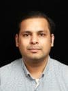 Professional headshot of an author Mayank Gupta