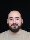 Headshot of Itay Atas, AWS Solutions Architect