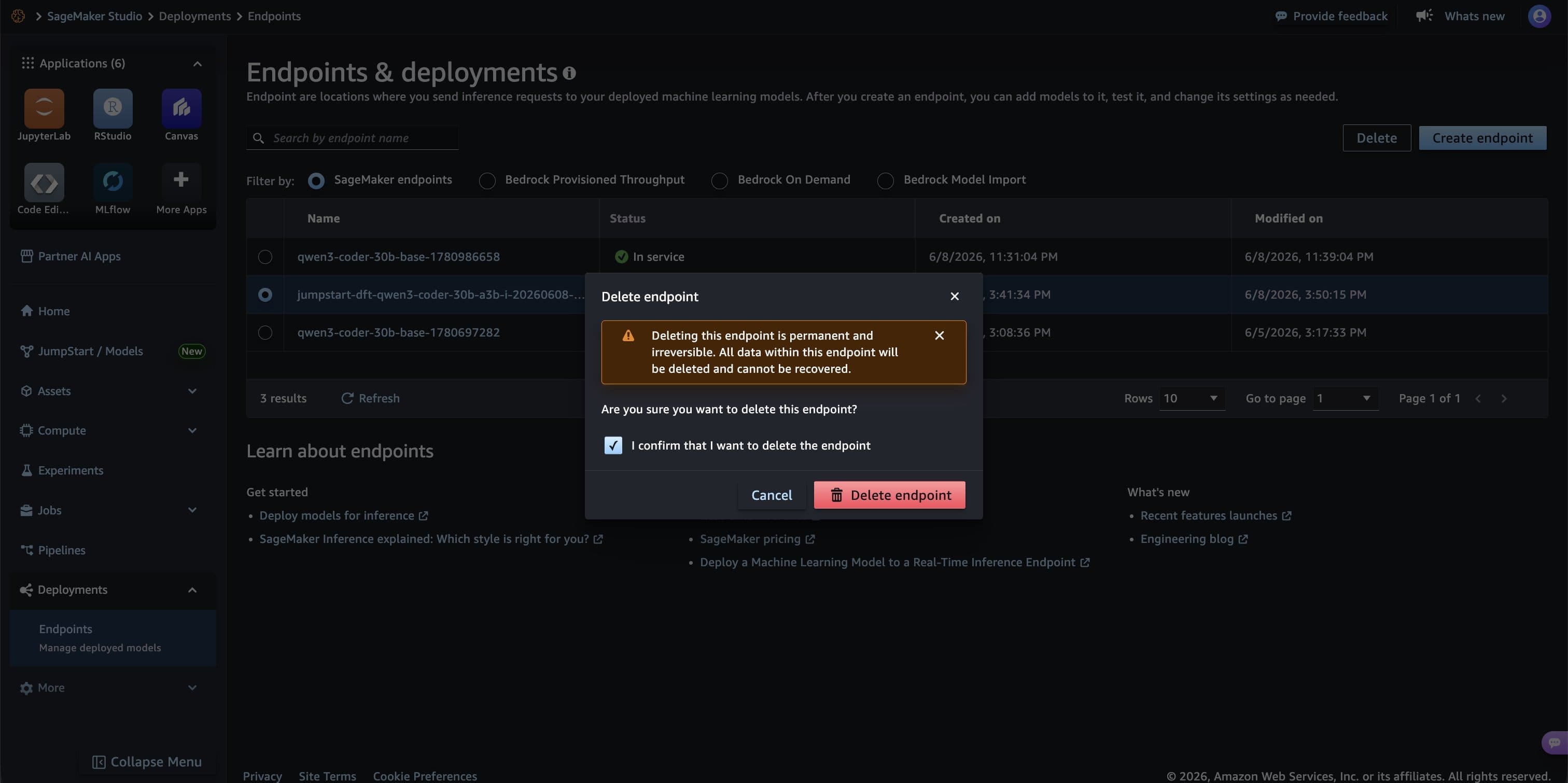 Endpoint delete confirmation dialog in Amazon SageMaker Studio with the confirmation checkbox visible.